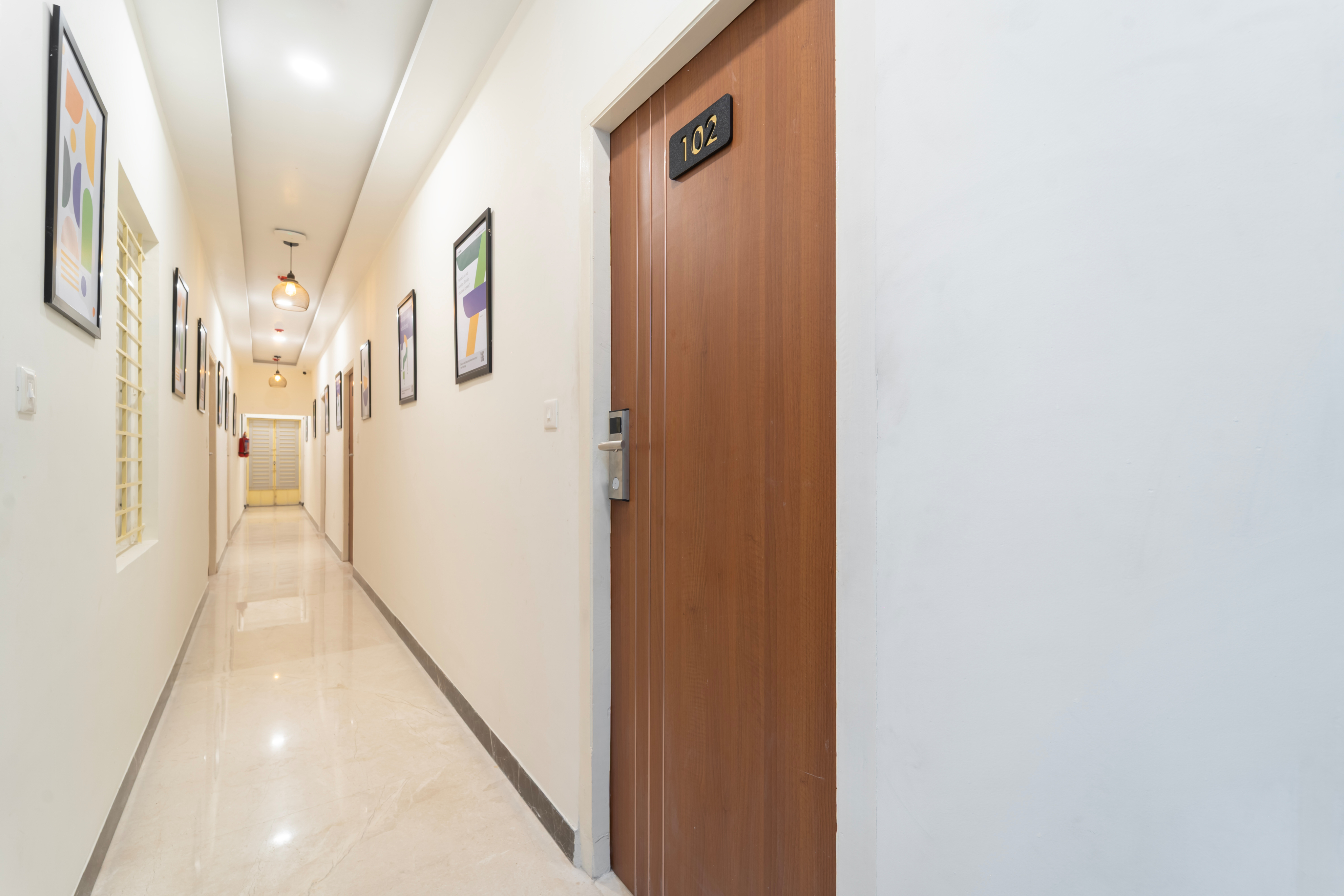 A bright hallway leading to guest rooms
